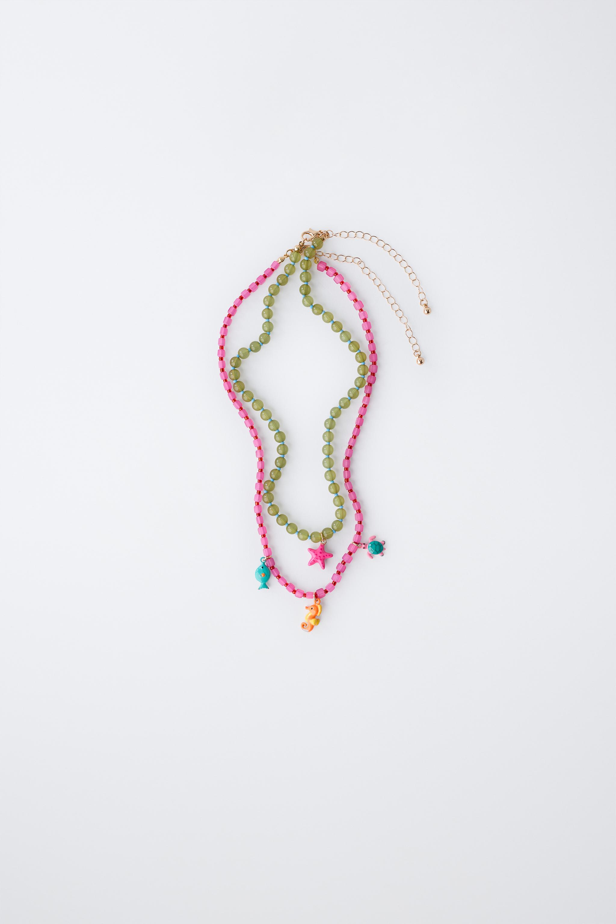 LOT DE DEUX COLLIERS FANTAISIE MER